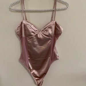 Pretty little thing pink thong body suit